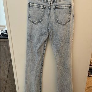 KanCan size 5/26 acid wash flare jeans with a raw hem